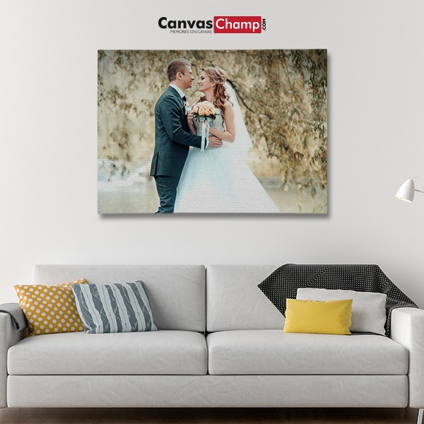 CanvasChamp wedding photo canvas hanging above a sofa in a living room