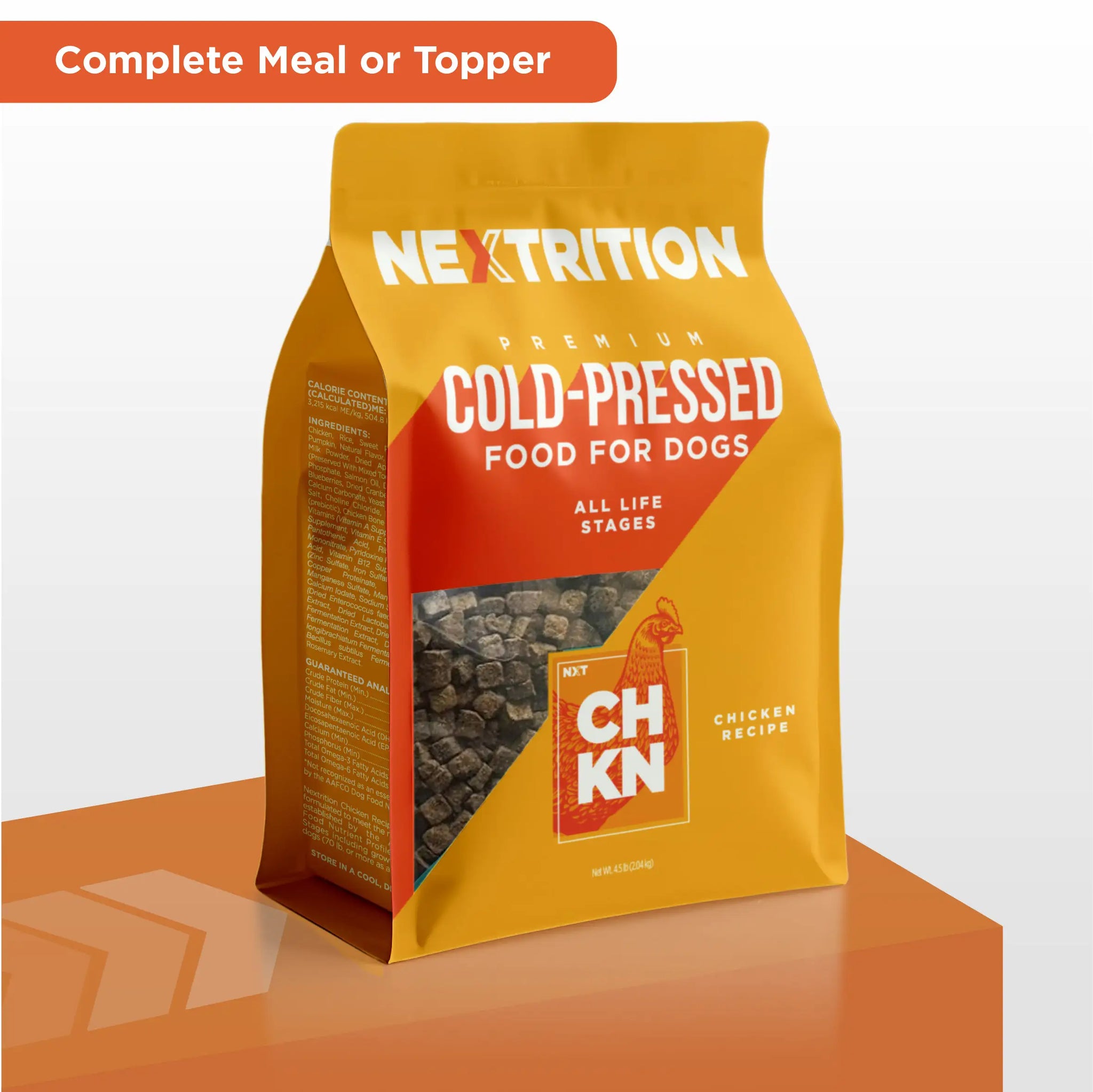 Nextrition cold-pressed chicken dog food in yellow and orange packaging