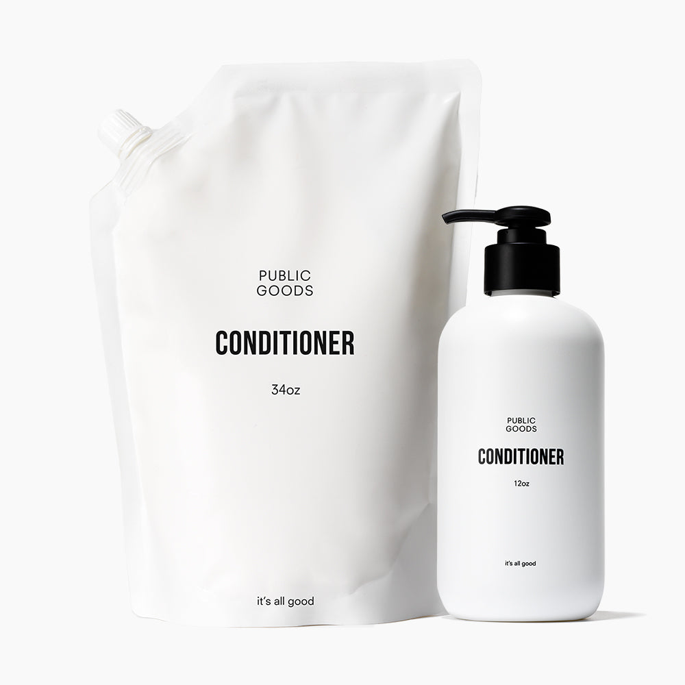 Public Goods conditioner bottle displayed with a larger refill pouch