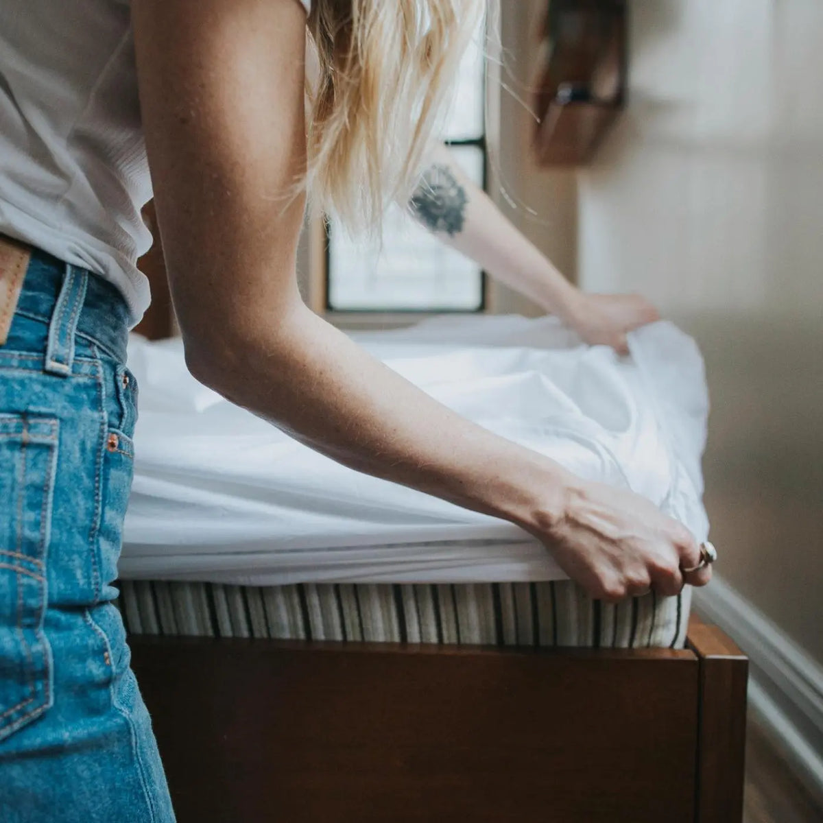 Essentia GOTS certified organic cotton sheets on a bed