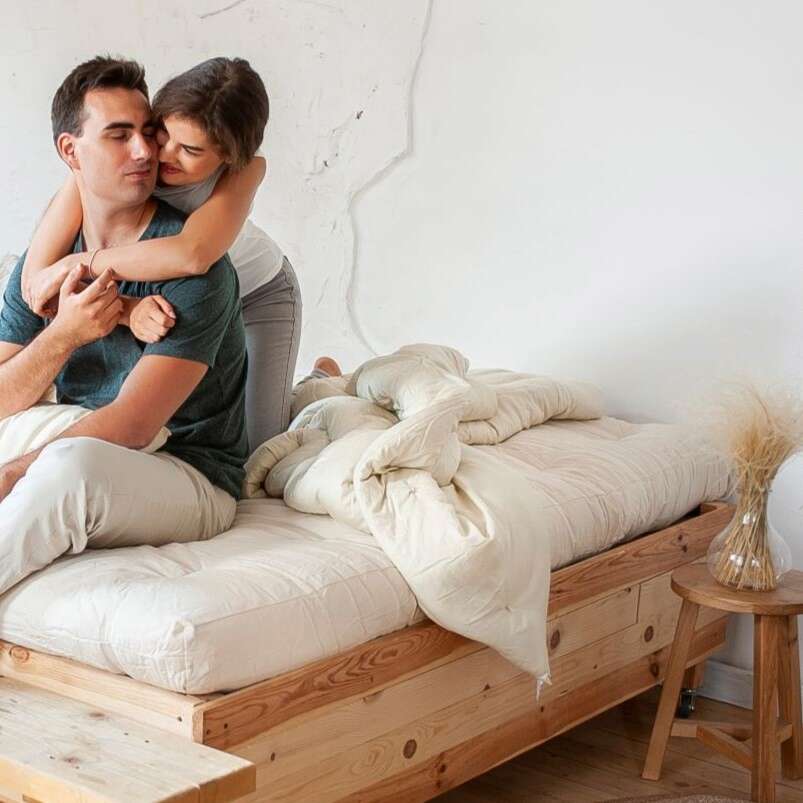 White Lotus Home natural mattress and bedding in a bedroom